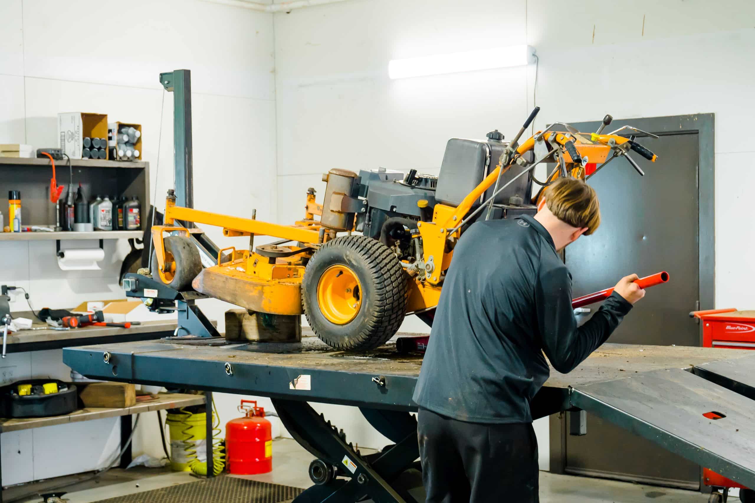 Service repairs on a mower